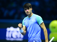 Carlos Alcaraz competes during the Nitto ATP Finals 2024 Group B match against Andrej Rublev at Inalpi Arena in Milan, Italy, on November 13...