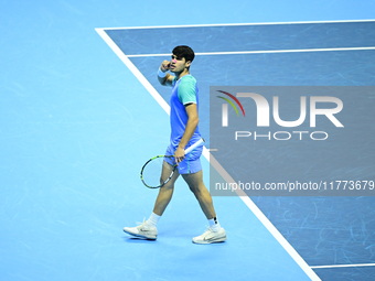 Carlos Alcaraz competes during the Nitto ATP Finals 2024 Group B match against Andrej Rublev at Inalpi Arena in Milan, Italy, on November 13...