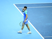 Carlos Alcaraz competes during the Nitto ATP Finals 2024 Group B match against Andrej Rublev at Inalpi Arena in Milan, Italy, on November 13...