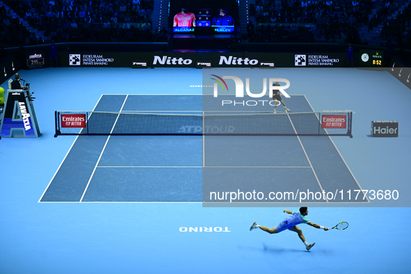 Andrej Rublev and Carlos Alcaraz compete during the Nitto ATP Finals 2024 Group B match at Inalpi Arena in Milan, Italy, on November 13, 202...