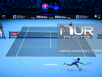 Andrej Rublev and Carlos Alcaraz compete during the Nitto ATP Finals 2024 Group B match at Inalpi Arena in Milan, Italy, on November 13, 202...