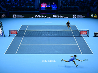 Andrej Rublev and Carlos Alcaraz compete during the Nitto ATP Finals 2024 Group B match at Inalpi Arena in Milan, Italy, on November 13, 202...