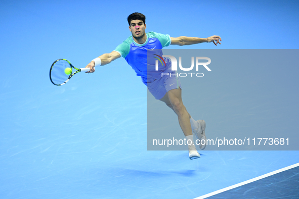 Carlos Alcaraz competes during the Nitto ATP Finals 2024 Group B match against Andrej Rublev at Inalpi Arena in Milan, Italy, on November 13...