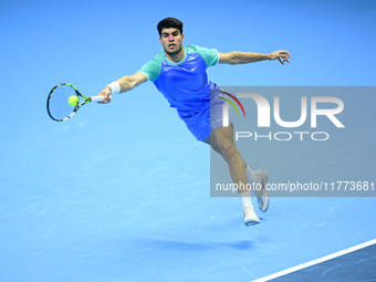 Carlos Alcaraz competes during the Nitto ATP Finals 2024 Group B match against Andrej Rublev at Inalpi Arena in Milan, Italy, on November 13...