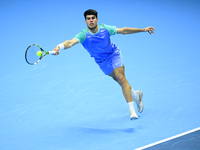 Carlos Alcaraz competes during the Nitto ATP Finals 2024 Group B match against Andrej Rublev at Inalpi Arena in Milan, Italy, on November 13...