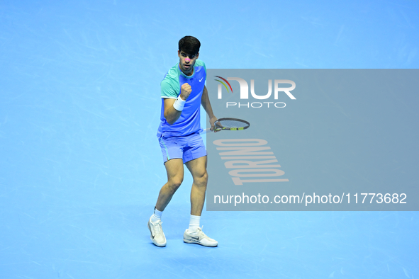 Carlos Alcaraz competes during the Nitto ATP Finals 2024 Group B match against Andrej Rublev at Inalpi Arena in Milan, Italy, on November 13...