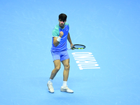 Carlos Alcaraz competes during the Nitto ATP Finals 2024 Group B match against Andrej Rublev at Inalpi Arena in Milan, Italy, on November 13...