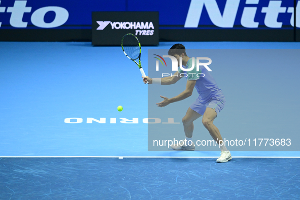 Carlos Alcaraz competes during the Nitto ATP Finals 2024 Group B match against Andrej Rublev at Inalpi Arena in Milan, Italy, on November 13...