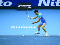 Carlos Alcaraz competes during the Nitto ATP Finals 2024 Group B match against Andrej Rublev at Inalpi Arena in Milan, Italy, on November 13...