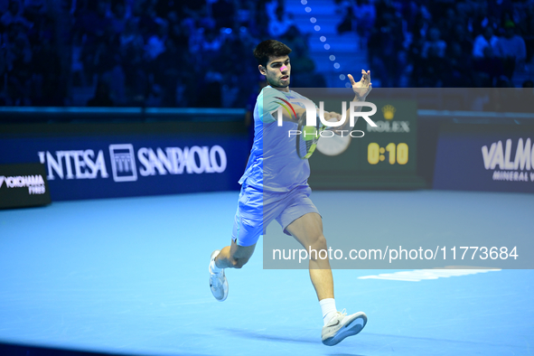 Carlos Alcaraz competes during the Nitto ATP Finals 2024 Group B match against Andrej Rublev at Inalpi Arena in Milan, Italy, on November 13...