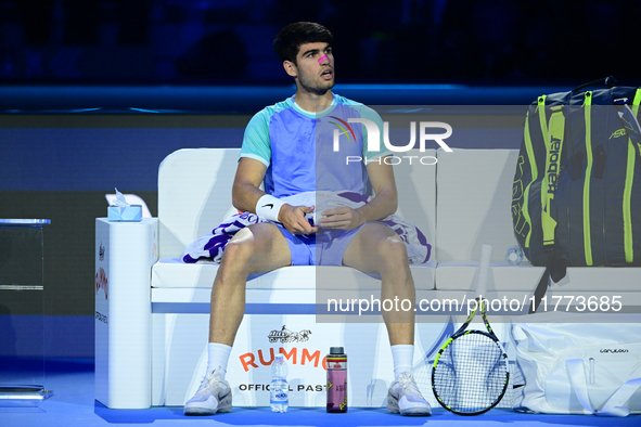 Carlos Alcaraz competes during the Nitto ATP Finals 2024 Group B match against Andrej Rublev at Inalpi Arena in Milan, Italy, on November 13...