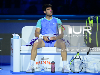 Carlos Alcaraz competes during the Nitto ATP Finals 2024 Group B match against Andrej Rublev at Inalpi Arena in Milan, Italy, on November 13...