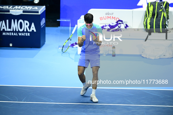 Carlos Alcaraz competes during the Nitto ATP Finals 2024 Group B match against Andrej Rublev at Inalpi Arena in Milan, Italy, on November 13...