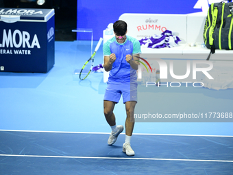 Carlos Alcaraz competes during the Nitto ATP Finals 2024 Group B match against Andrej Rublev at Inalpi Arena in Milan, Italy, on November 13...