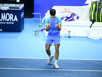 Carlos Alcaraz competes during the Nitto ATP Finals 2024 Group B match against Andrej Rublev at Inalpi Arena in Milan, Italy, on November 13...