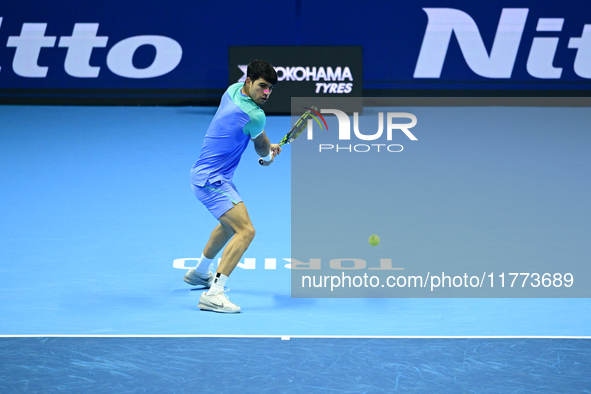 Carlos Alcaraz competes during the Nitto ATP Finals 2024 Group B match against Andrej Rublev at Inalpi Arena in Milan, Italy, on November 13...