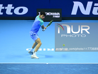 Carlos Alcaraz competes during the Nitto ATP Finals 2024 Group B match against Andrej Rublev at Inalpi Arena in Milan, Italy, on November 13...