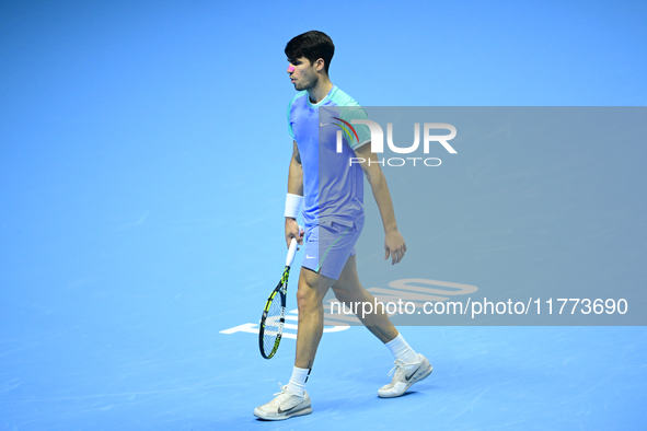 Carlos Alcaraz competes during the Nitto ATP Finals 2024 Group B match against Andrej Rublev at Inalpi Arena in Milan, Italy, on November 13...