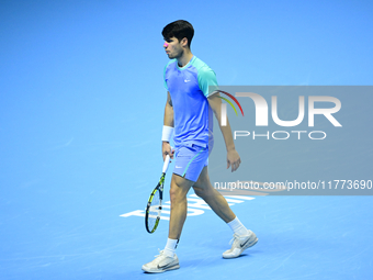 Carlos Alcaraz competes during the Nitto ATP Finals 2024 Group B match against Andrej Rublev at Inalpi Arena in Milan, Italy, on November 13...