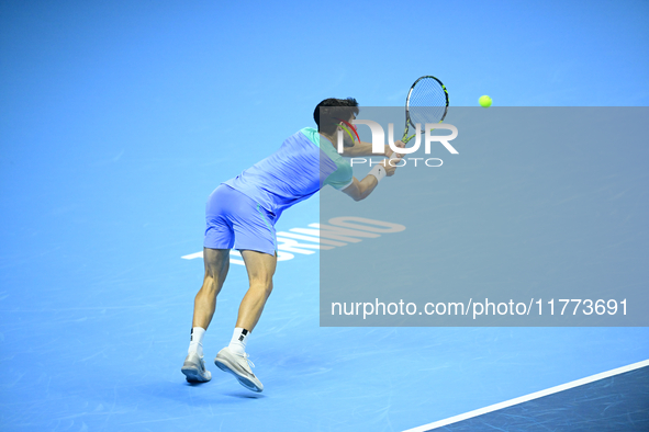 Carlos Alcaraz competes during the Nitto ATP Finals 2024 Group B match against Andrej Rublev at Inalpi Arena in Milan, Italy, on November 13...