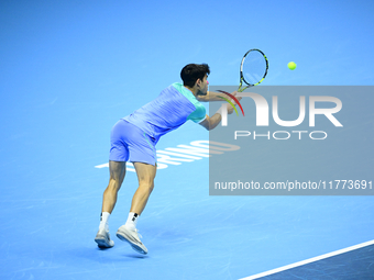 Carlos Alcaraz competes during the Nitto ATP Finals 2024 Group B match against Andrej Rublev at Inalpi Arena in Milan, Italy, on November 13...