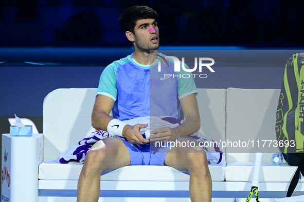 Carlos Alcaraz competes during the Nitto ATP Finals 2024 Group B match against Andrej Rublev at Inalpi Arena in Milan, Italy, on November 13...