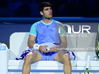 Carlos Alcaraz competes during the Nitto ATP Finals 2024 Group B match against Andrej Rublev at Inalpi Arena in Milan, Italy, on November 13...