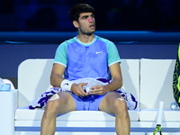 Carlos Alcaraz competes during the Nitto ATP Finals 2024 Group B match against Andrej Rublev at Inalpi Arena in Milan, Italy, on November 13...