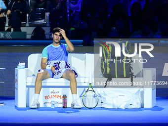 Carlos Alcaraz competes during the Nitto ATP Finals 2024 Group B match against Andrej Rublev at Inalpi Arena in Milan, Italy, on November 13...