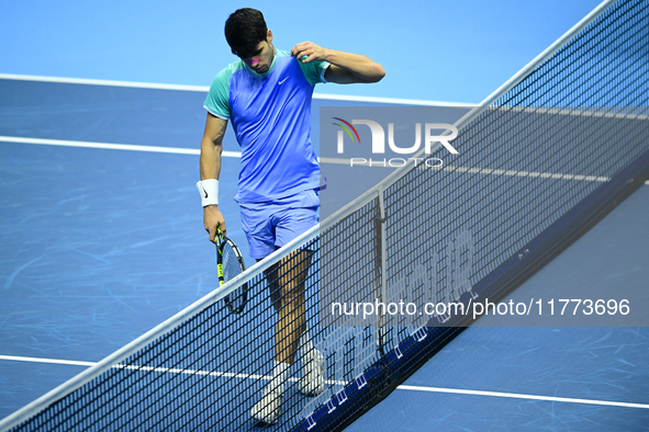 Carlos Alcaraz competes during the Nitto ATP Finals 2024 Group B match against Andrej Rublev at Inalpi Arena in Milan, Italy, on November 13...