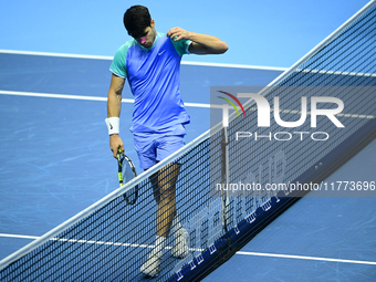 Carlos Alcaraz competes during the Nitto ATP Finals 2024 Group B match against Andrej Rublev at Inalpi Arena in Milan, Italy, on November 13...