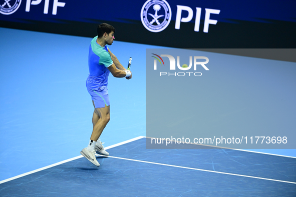 Carlos Alcaraz competes during the Nitto ATP Finals 2024 Group B match against Andrej Rublev at Inalpi Arena in Milan, Italy, on November 13...