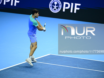 Carlos Alcaraz competes during the Nitto ATP Finals 2024 Group B match against Andrej Rublev at Inalpi Arena in Milan, Italy, on November 13...