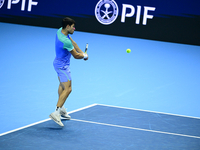 Carlos Alcaraz competes during the Nitto ATP Finals 2024 Group B match against Andrej Rublev at Inalpi Arena in Milan, Italy, on November 13...