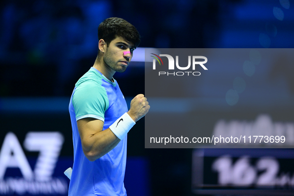 Carlos Alcaraz competes during the Nitto ATP Finals 2024 Group B match against Andrej Rublev at Inalpi Arena in Milan, Italy, on November 13...