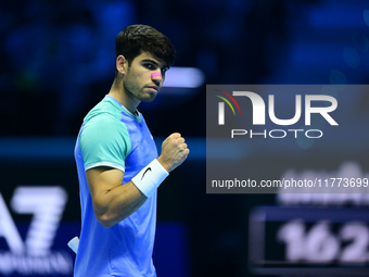 Carlos Alcaraz competes during the Nitto ATP Finals 2024 Group B match against Andrej Rublev at Inalpi Arena in Milan, Italy, on November 13...