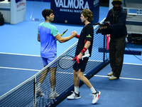 Carlos Alcaraz and Andrej Rublev compete in the Nitto ATP Finals 2024 Group B match at Inalpi Arena in Milan, Italy, on November 13, 2024. (