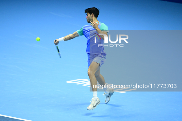 Carlos Alcaraz competes during the Nitto ATP Finals 2024 Group B match against Andrej Rublev at Inalpi Arena in Milan, Italy, on November 13...