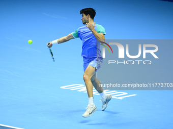 Carlos Alcaraz competes during the Nitto ATP Finals 2024 Group B match against Andrej Rublev at Inalpi Arena in Milan, Italy, on November 13...