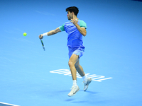 Carlos Alcaraz competes during the Nitto ATP Finals 2024 Group B match against Andrej Rublev at Inalpi Arena in Milan, Italy, on November 13...