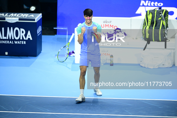 Carlos Alcaraz competes during the Nitto ATP Finals 2024 Group B match against Andrej Rublev at Inalpi Arena in Milan, Italy, on November 13...