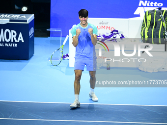 Carlos Alcaraz competes during the Nitto ATP Finals 2024 Group B match against Andrej Rublev at Inalpi Arena in Milan, Italy, on November 13...