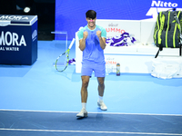 Carlos Alcaraz competes during the Nitto ATP Finals 2024 Group B match against Andrej Rublev at Inalpi Arena in Milan, Italy, on November 13...