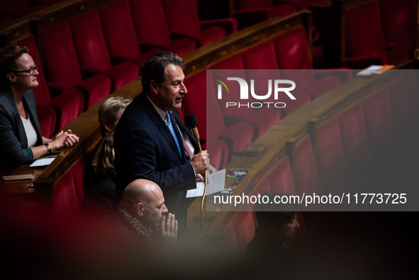 Sylvain Berrios, a member of the Horizons and Independents group, is in Parliament during question time in Paris, France, on November 13, 20...