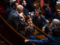 Olivia Gregoire, a member of the Together for the Republic group, is in Parliament during question time in Paris, France, on November 13, 20...