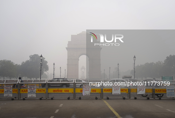 India Gate is covered in a thick layer of pollution in New Delhi, India, on November 13, 2024 