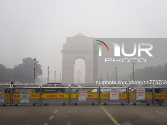 India Gate is covered in a thick layer of pollution in New Delhi, India, on November 13, 2024 (