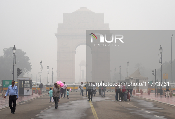 India Gate is covered in a thick layer of pollution in New Delhi, India, on November 13, 2024 