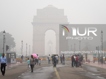 India Gate is covered in a thick layer of pollution in New Delhi, India, on November 13, 2024 (