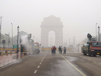 Water mist cannons, or ''anti-smog guns,'' are used near India Gate to reduce air pollution in New Delhi, India, on November 13, 2024 (